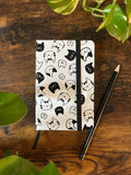 Cat Heads Notebook